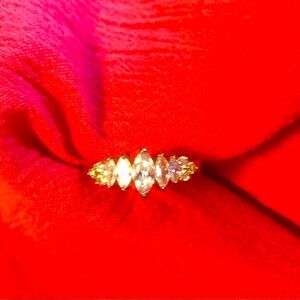 Never worn, Gold plated Sz. 11
(I guess) Faux Marquee Diamond Ring.